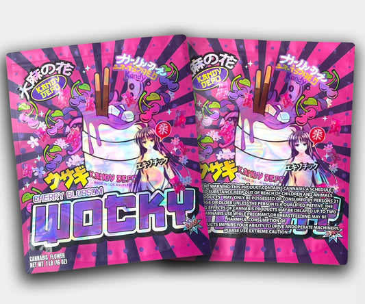 Front and back of Cherry Blossom Wocky 1lb mylar bag with anime girl art, a glossy milkshake, cherry blossom accents, pink gummy bears, and holographic “Wocky” branding in a large format.